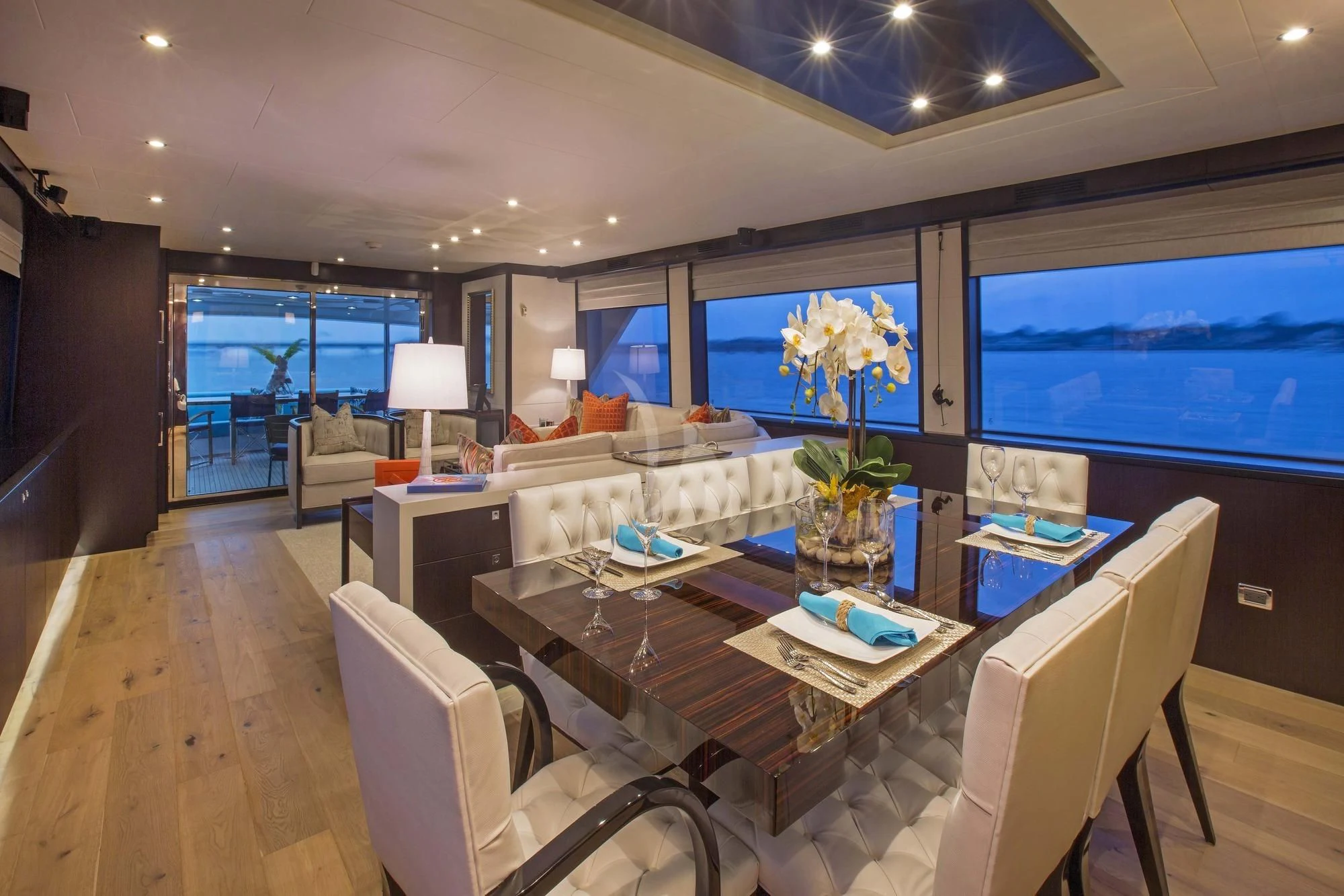 a large room with a large table and chairs aboard LADY CARMEN Yacht for Sale