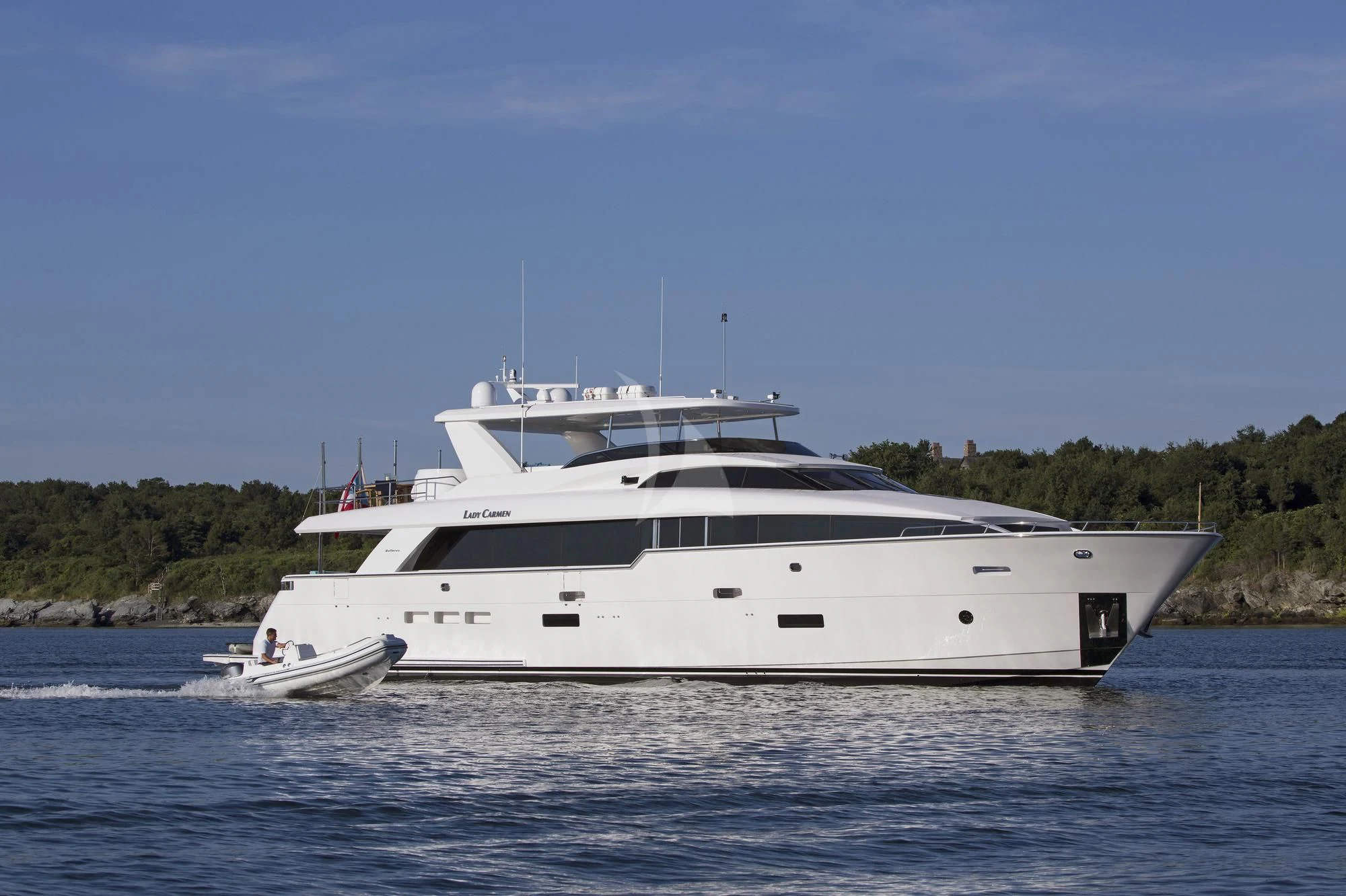a white yacht on the water aboard LADY CARMEN Yacht for Sale