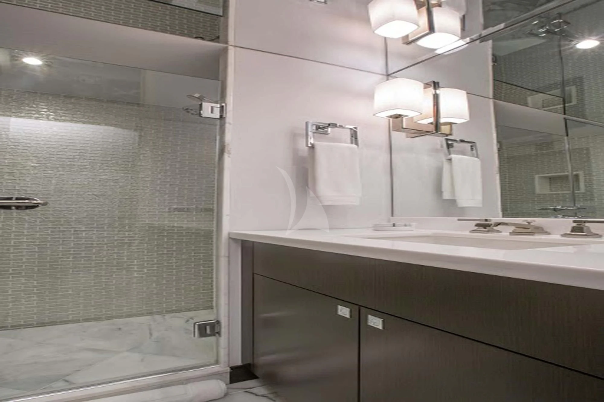 a bathroom with a glass shower aboard LADY CARMEN Yacht for Sale