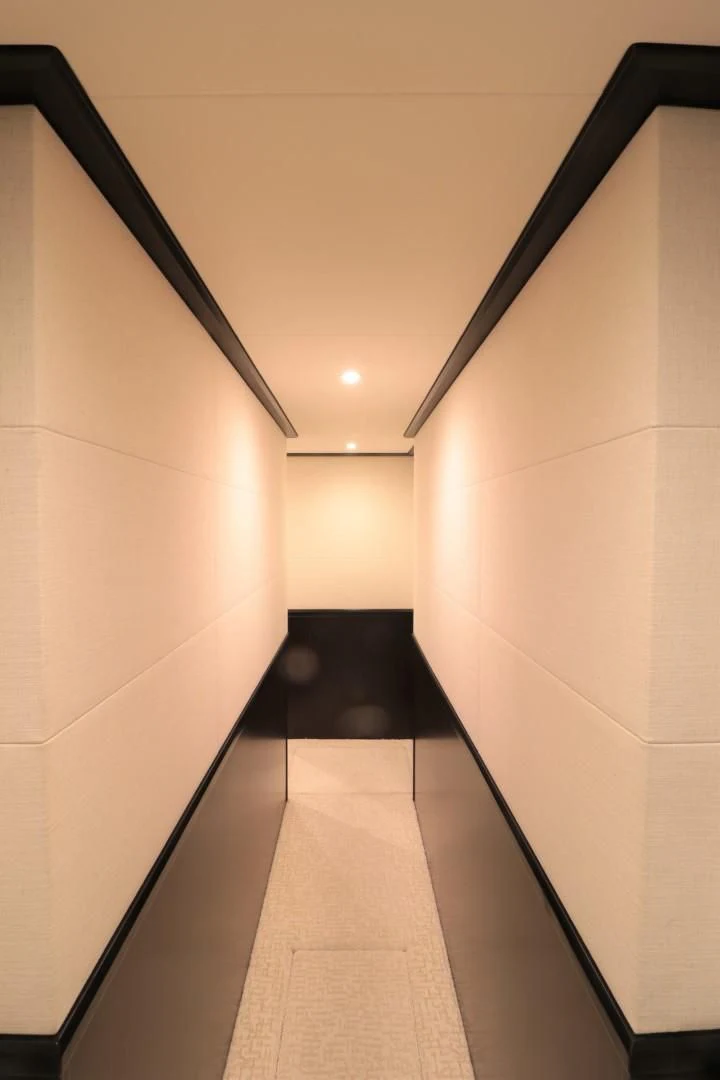 a hallway with white walls aboard LADY CARMEN Yacht for Sale