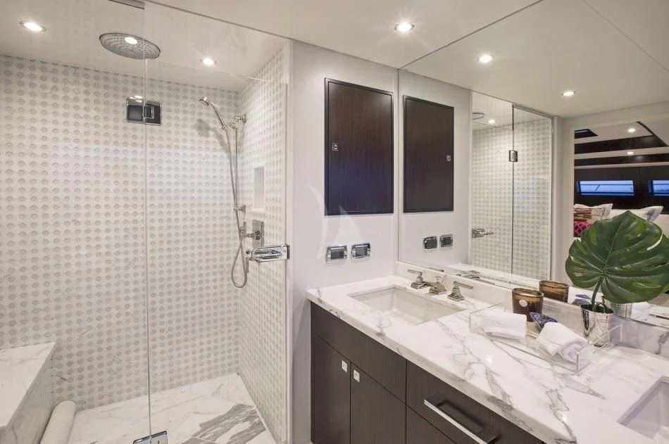 a bathroom with a large shower aboard LADY CARMEN Yacht for Sale