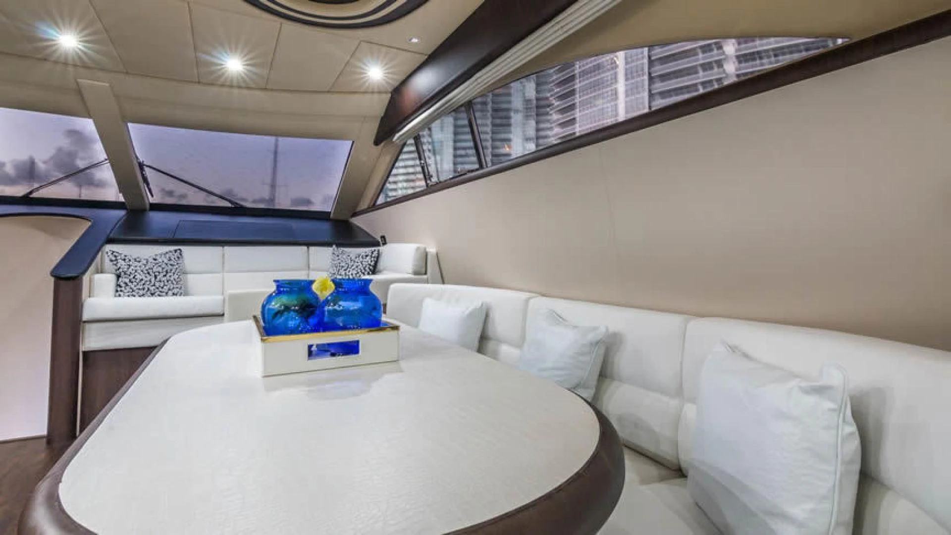 a room with a bed and a window aboard NEXT Yacht for Sale