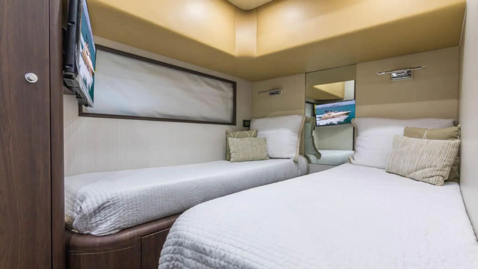 a room with two beds aboard NEXT Yacht for Sale