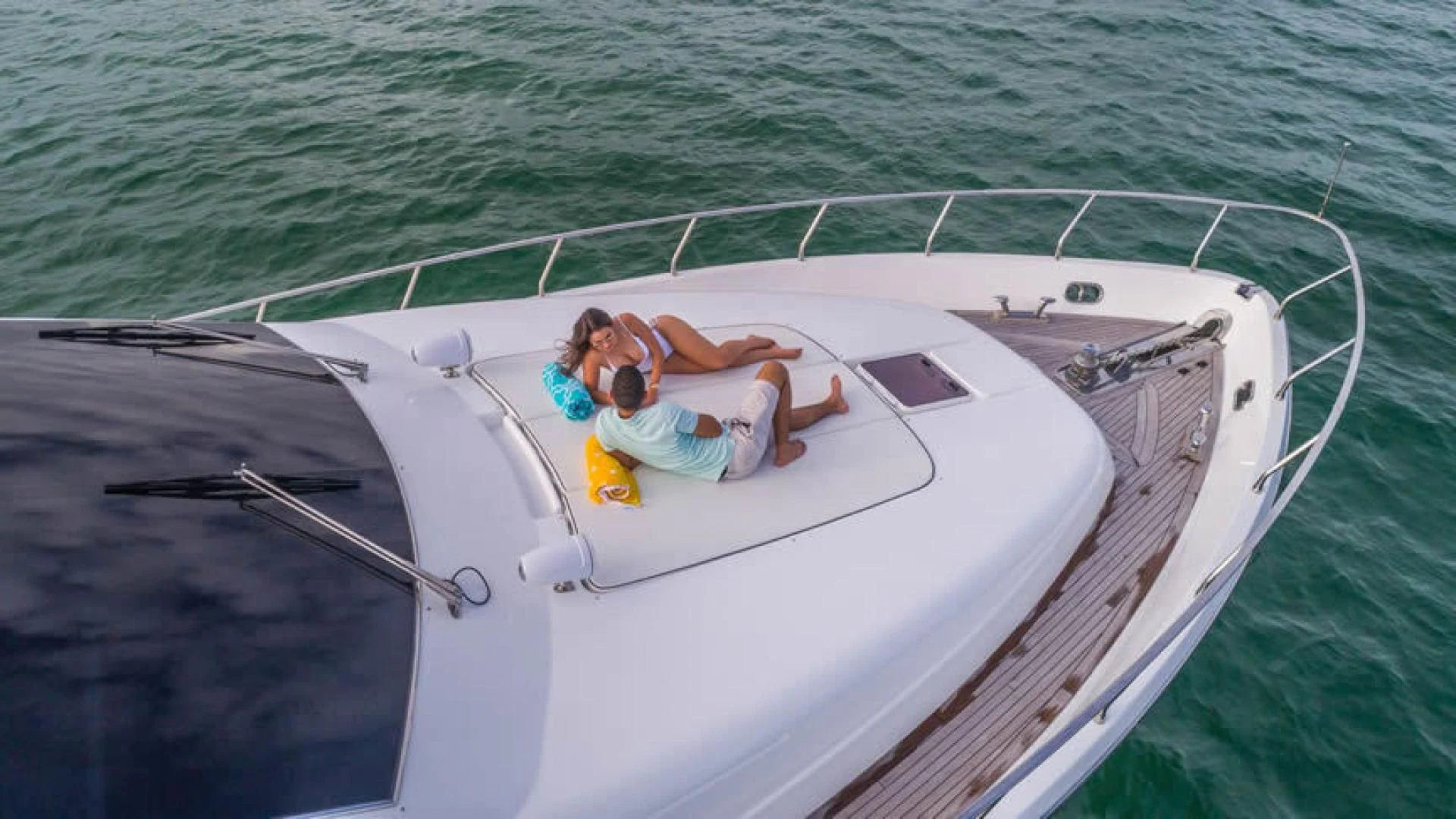 a man and woman on a boat aboard NEXT Yacht for Sale