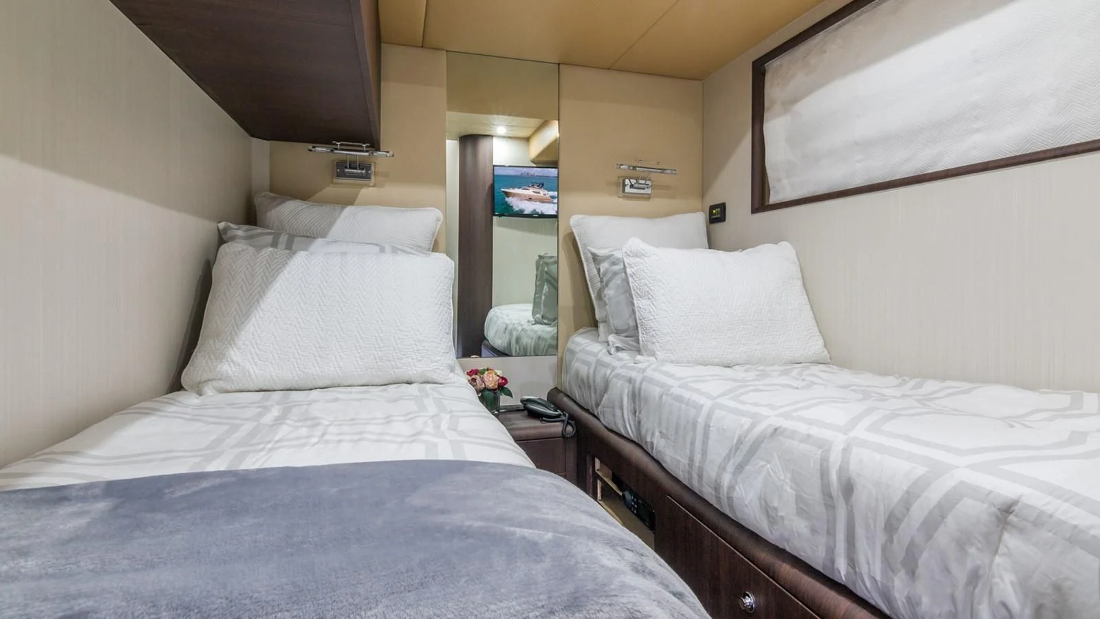 a couple of beds in a room aboard NEXT Yacht for Sale