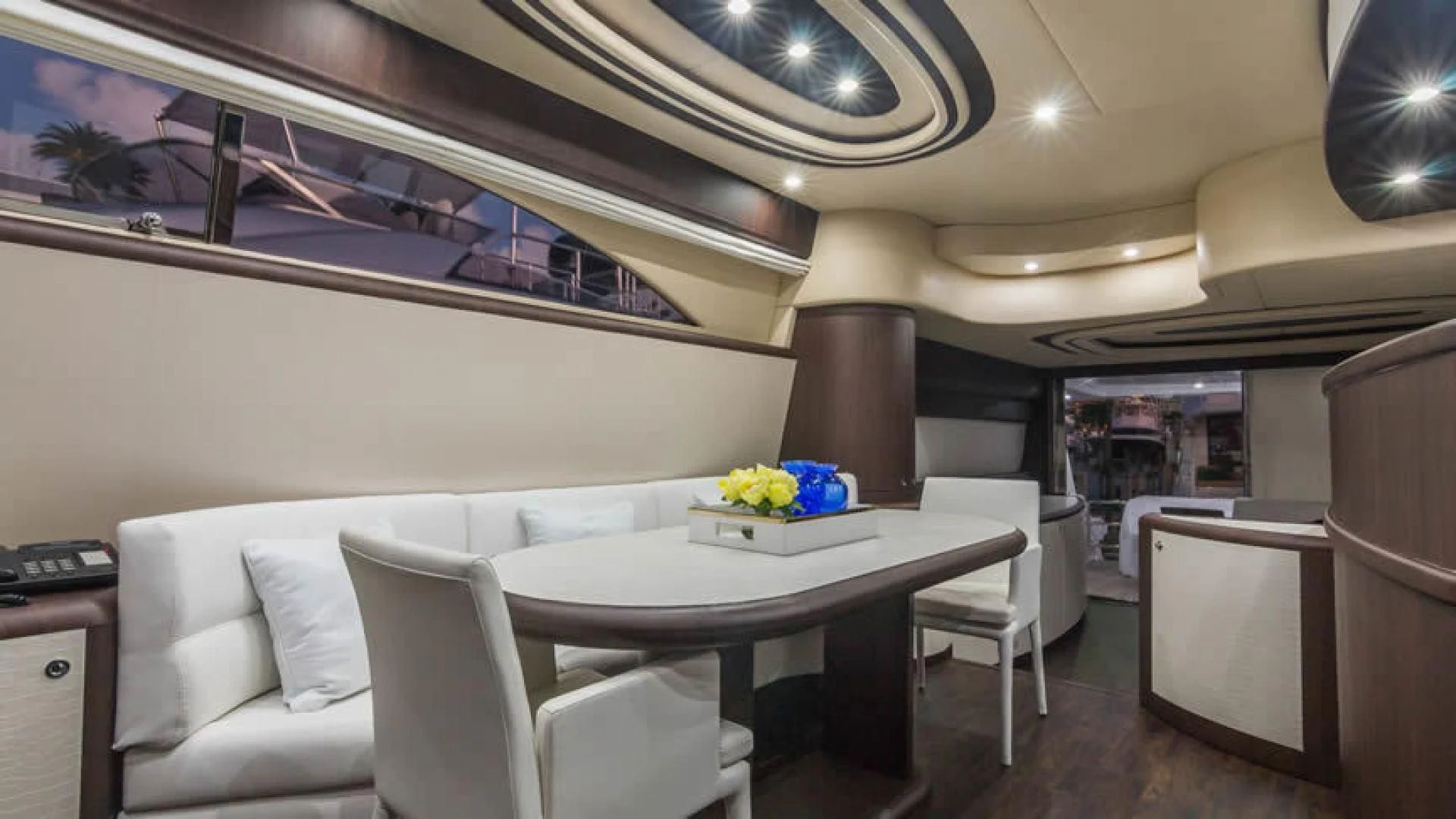 a room with a table and chairs aboard NEXT Yacht for Sale