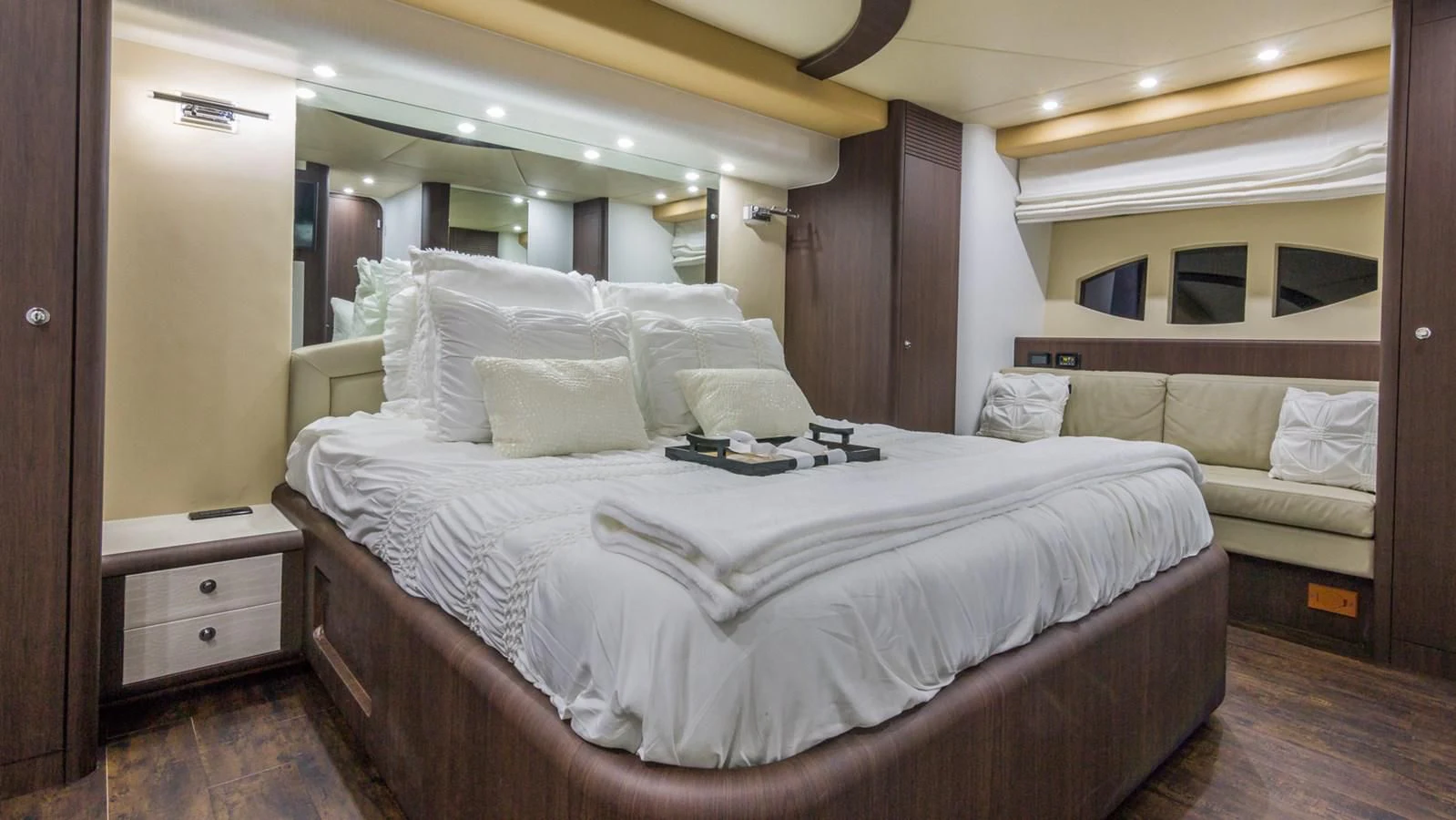 a room with a bed and a desk aboard NEXT Yacht for Sale