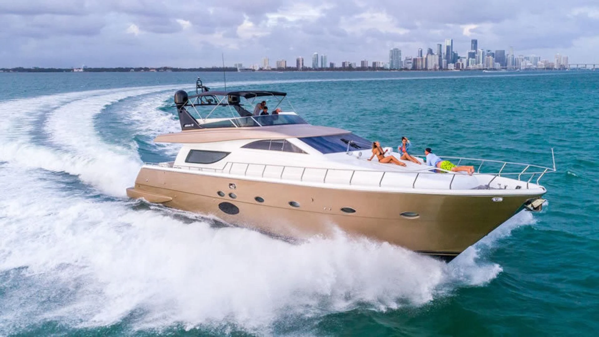 a white boat on the water aboard NEXT Yacht for Sale