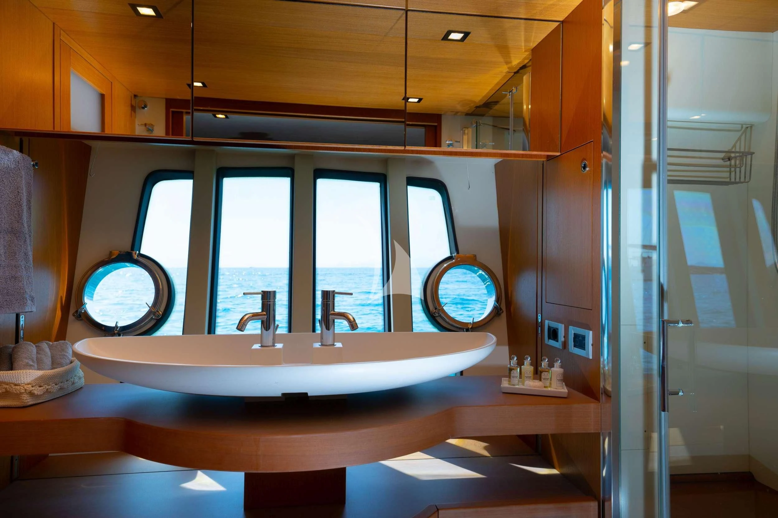 a kitchen with a large sink aboard NINETEEN Yacht for Charter