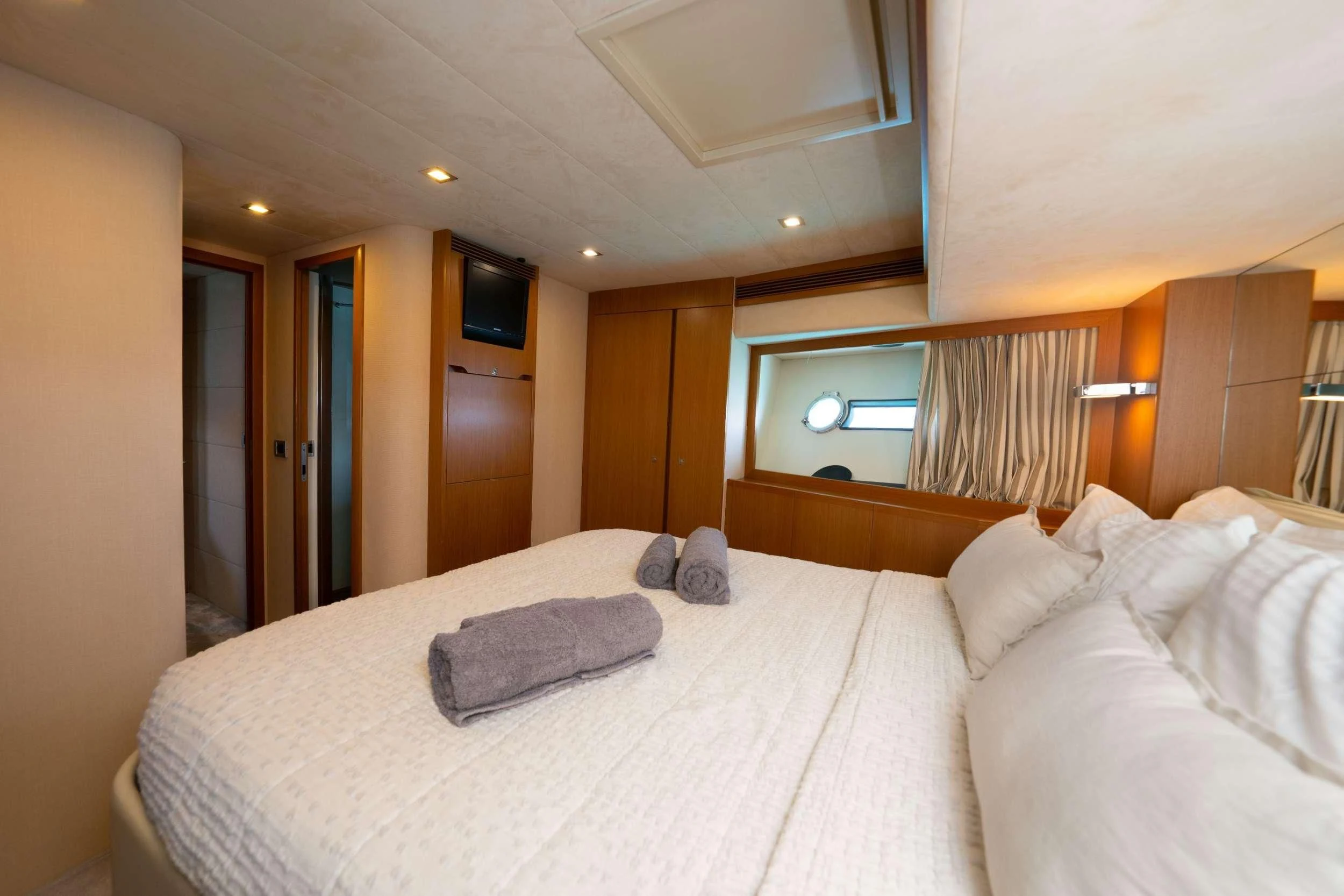 a bed in a hotel room aboard NINETEEN Yacht for Charter