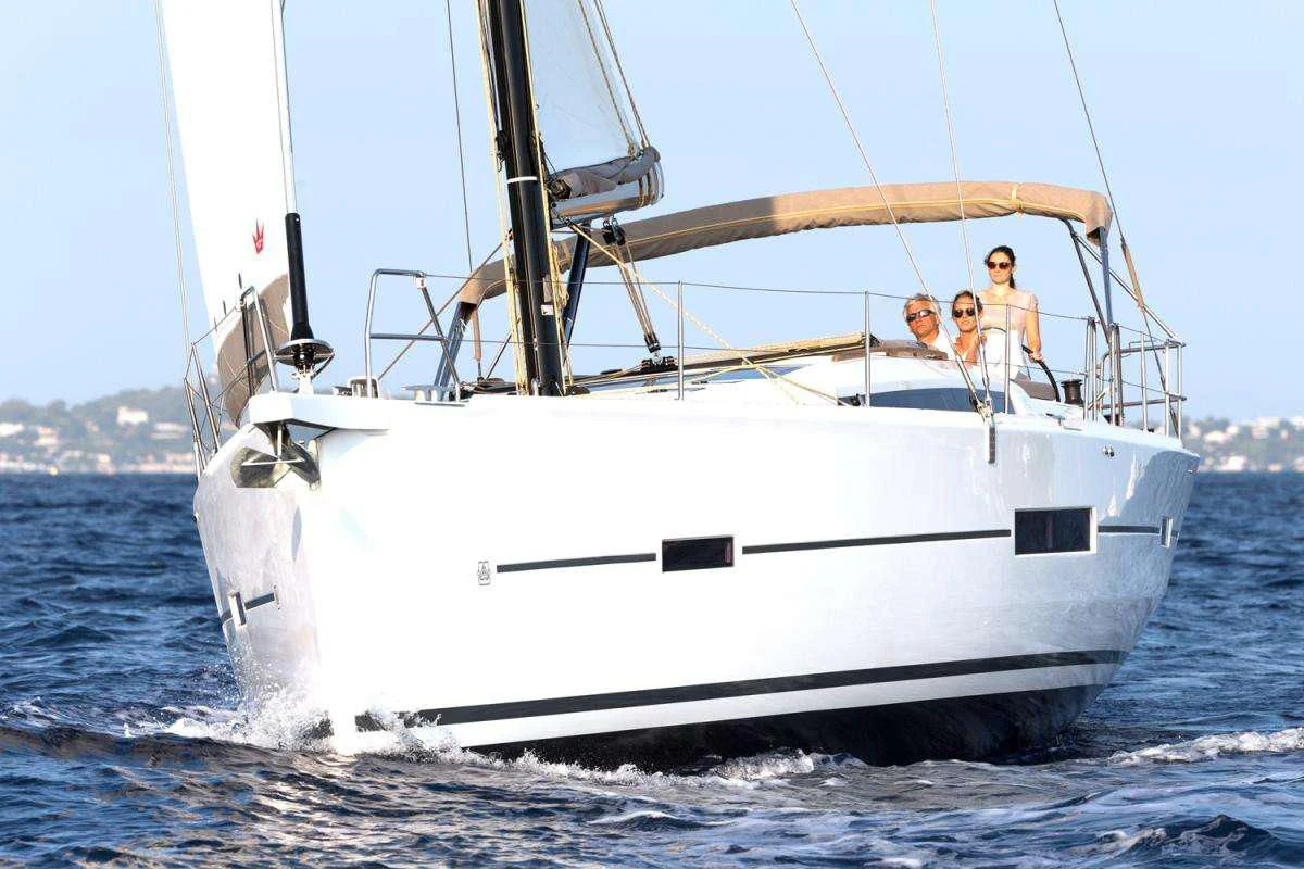 a white boat in the water aboard NINETEEN Yacht for Charter
