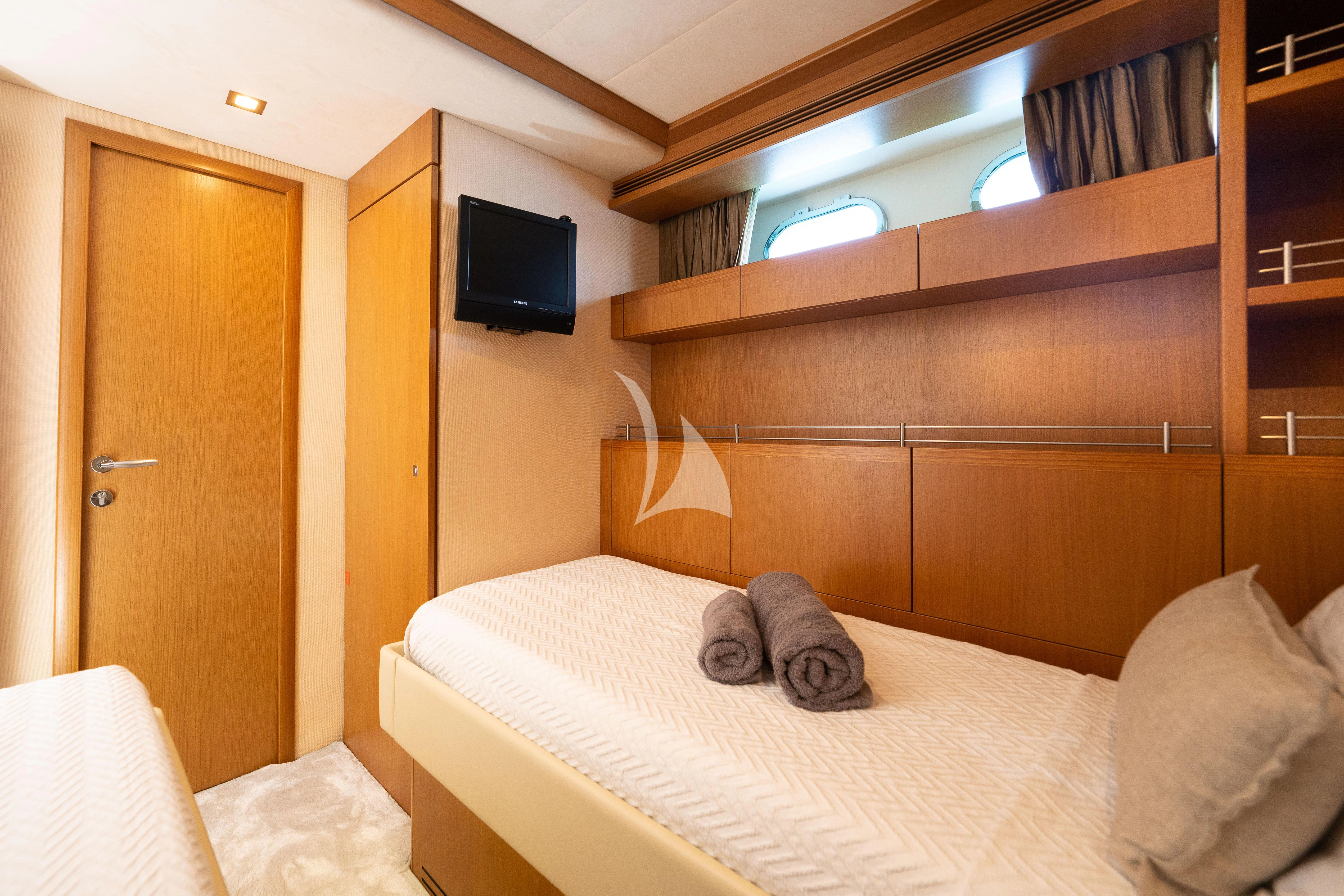 a bed in a room aboard NINETEEN Yacht for Charter