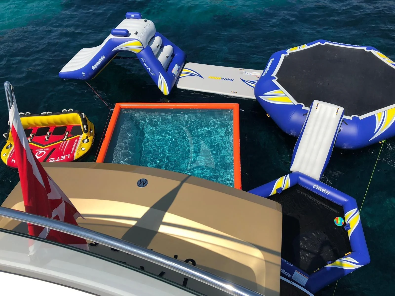 a group of boats on a body of water aboard KIMOJO Yacht for Sale