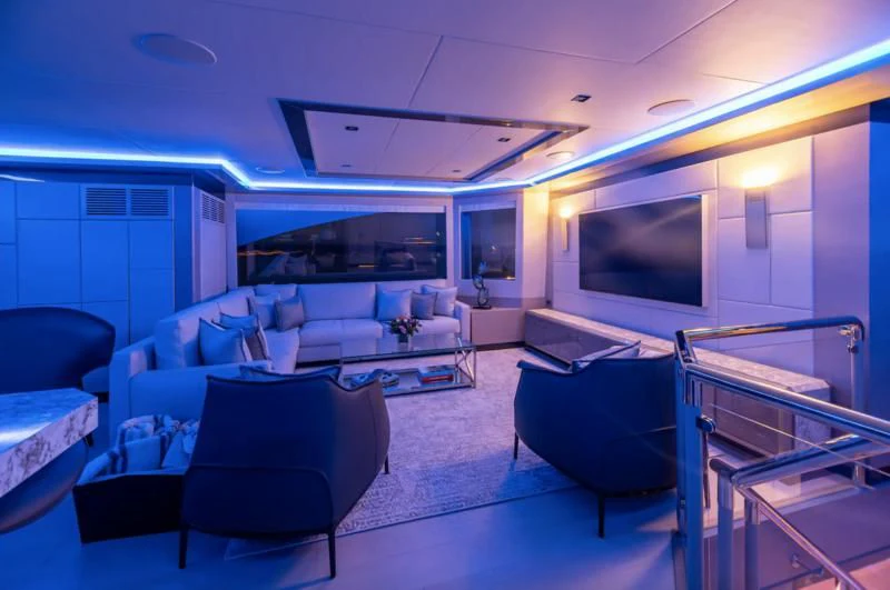 a room with a large screen aboard NIRVANA II Yacht for Sale