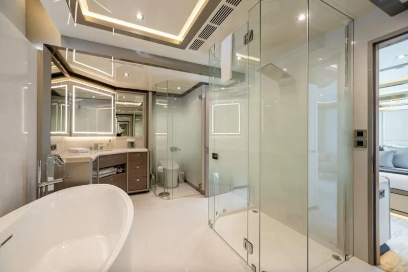 a bathroom with a large shower unit aboard NIRVANA II Yacht for Sale
