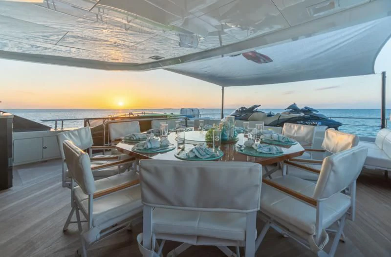 a table set for a meal aboard NIRVANA II Yacht for Sale