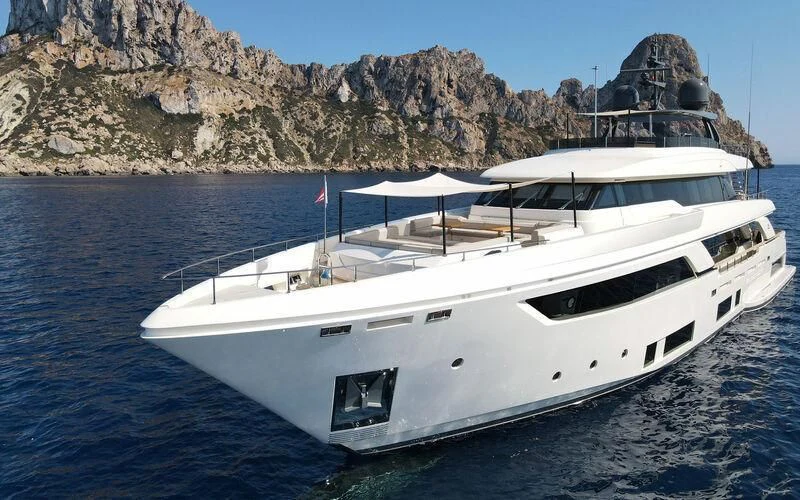 a white yacht in the water aboard WILLPOWER Yacht for Sale