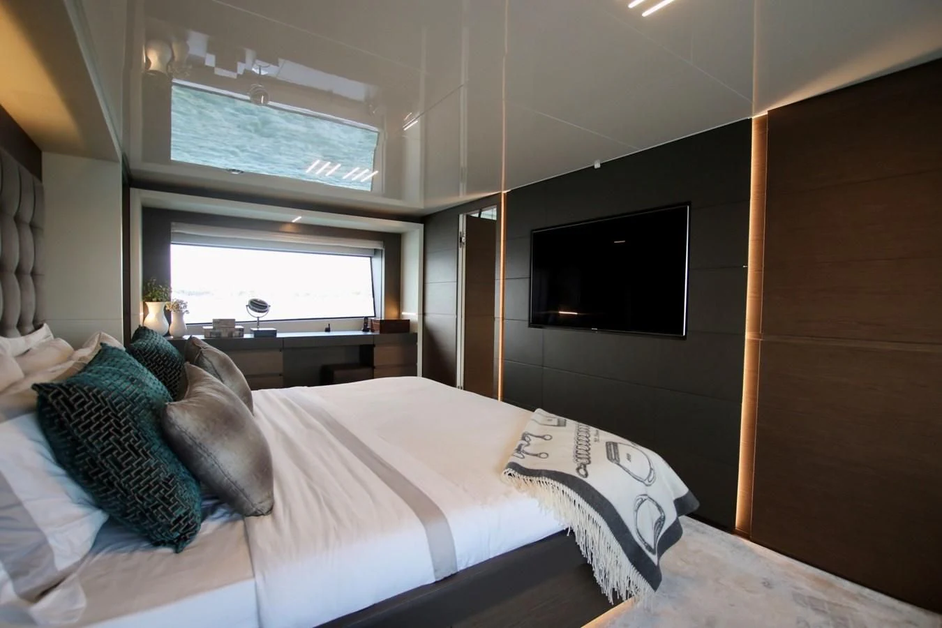 a bed with pillows and pillows aboard WILLPOWER Yacht for Sale