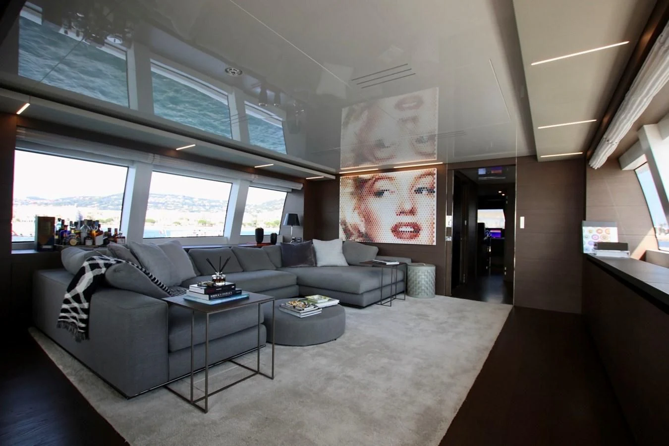 a room with couches and a table aboard WILLPOWER Yacht for Sale