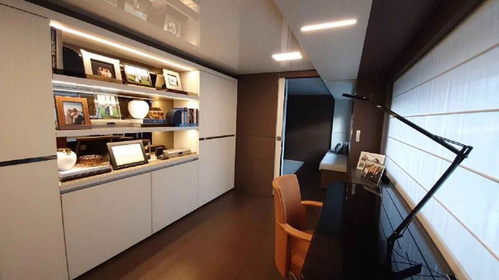 a room with a desk and a chair aboard WILLPOWER Yacht for Sale