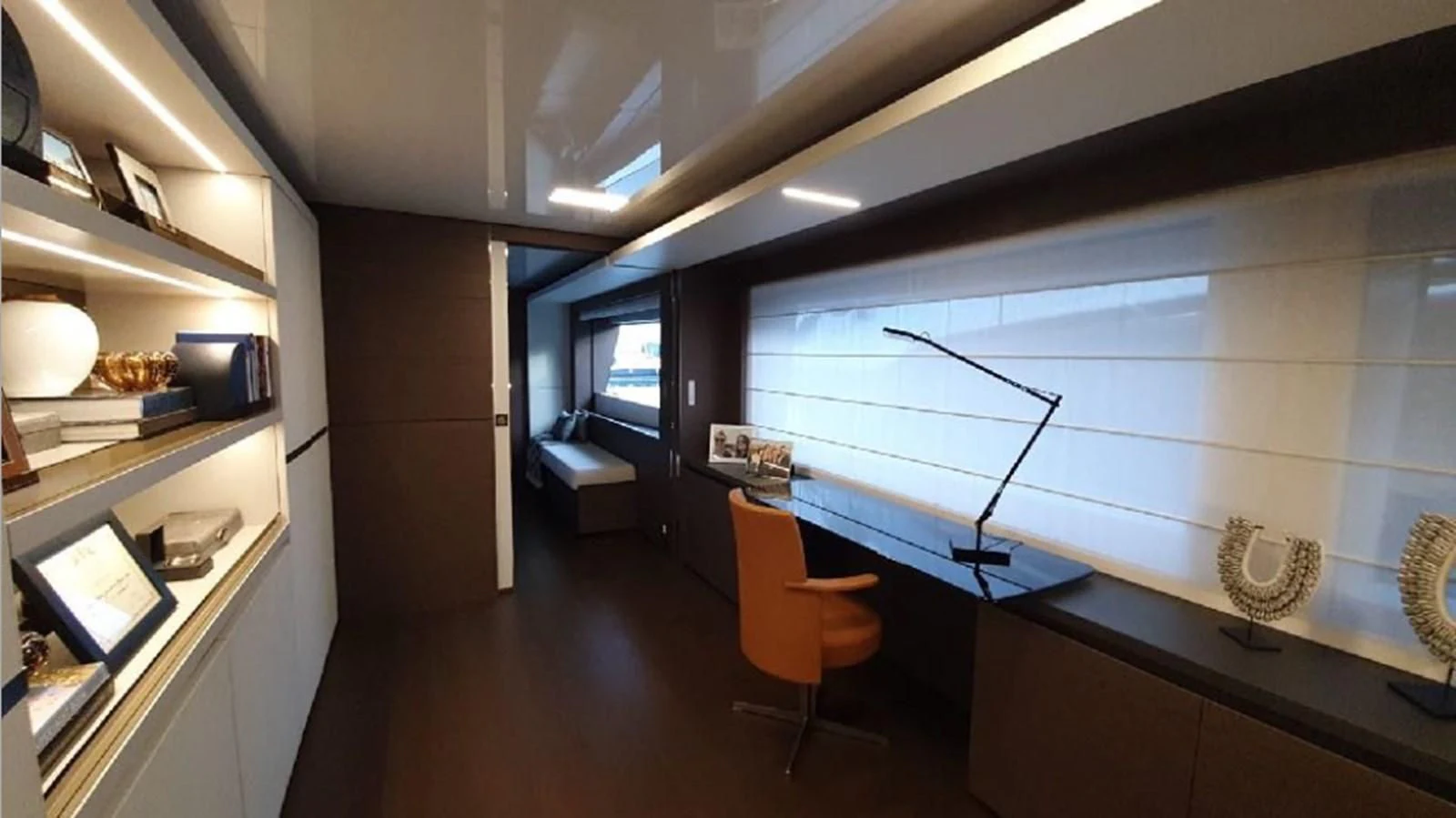 a room with a desk and a computer aboard WILLPOWER Yacht for Sale