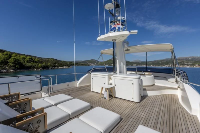 a boat on a deck aboard MANTA Yacht for Sale