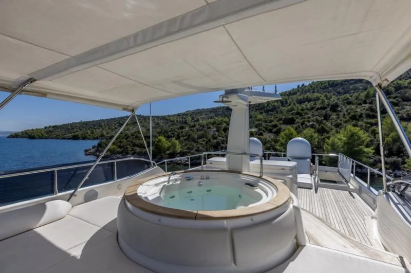 a pool on a deck aboard MANTA Yacht for Sale