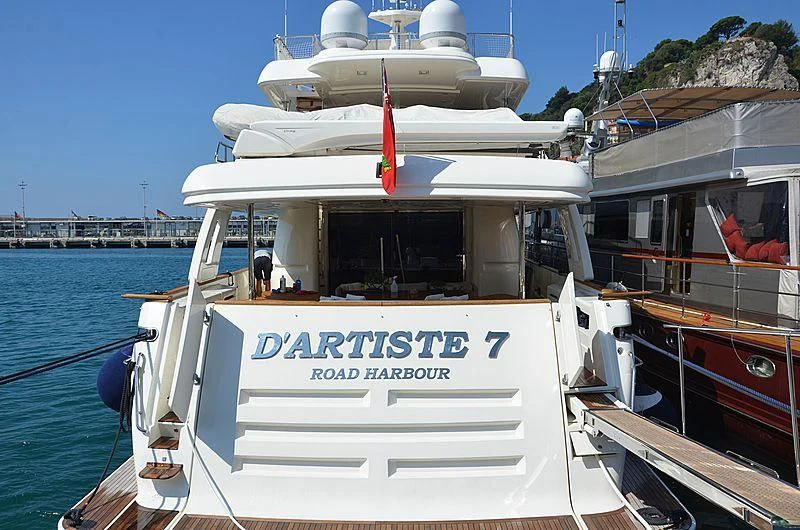 a boat docked at a pier aboard MANTA Yacht for Sale