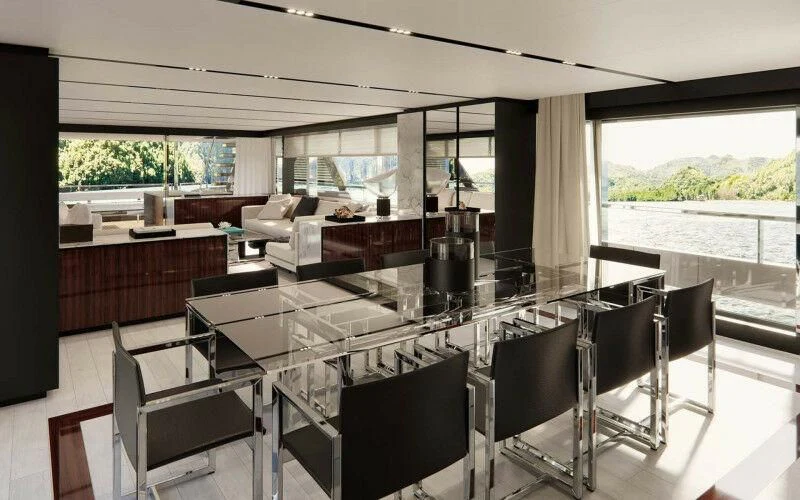 a large room with a table and chairs aboard JANUS NAVEM Yacht for Sale