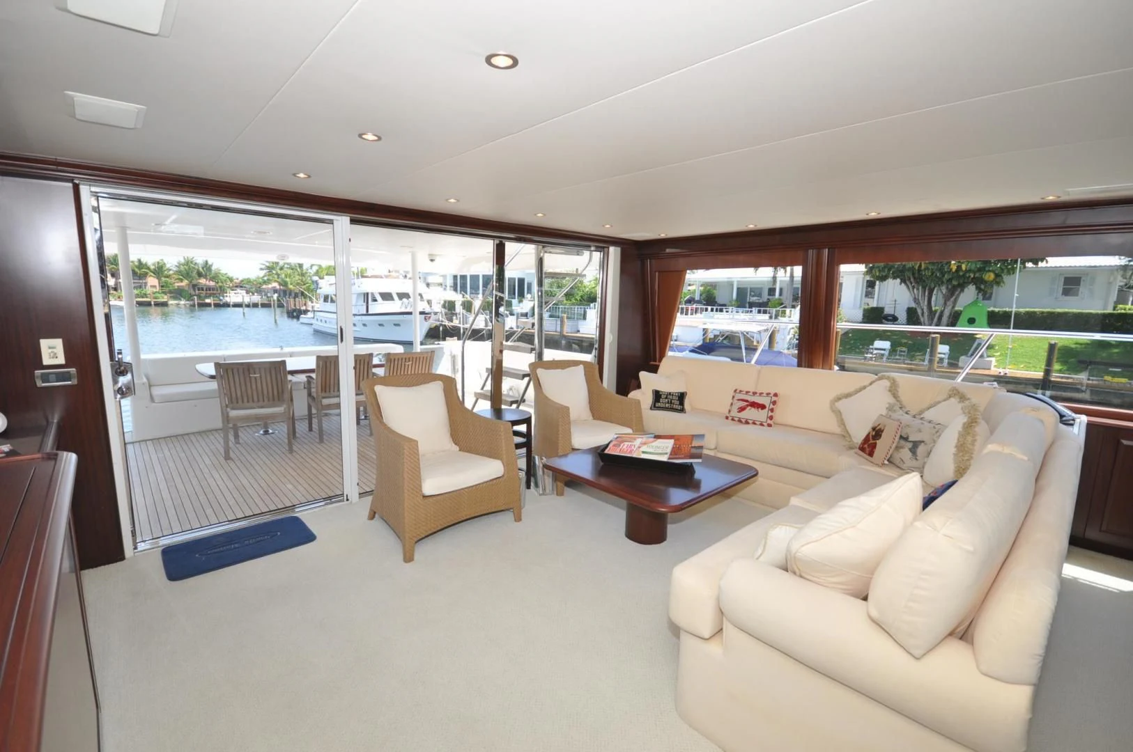 a living room with a large window aboard LUCK A LEE IV Yacht for Sale