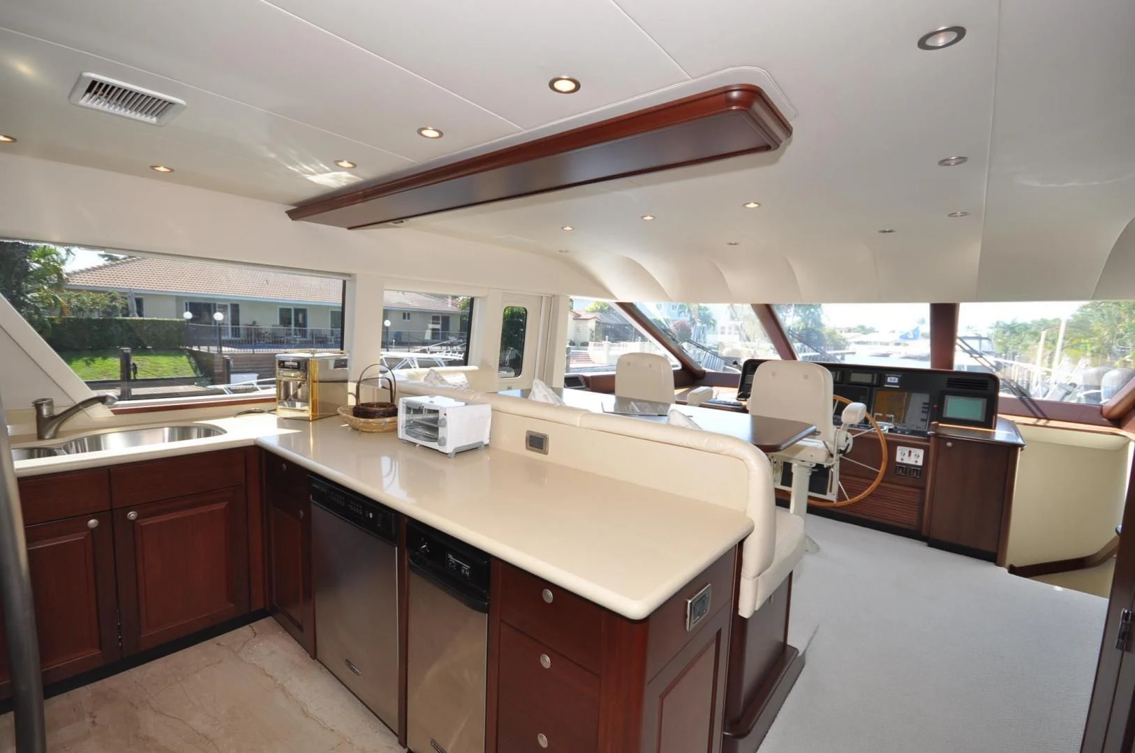 a large kitchen with a large window aboard LUCK A LEE IV Yacht for Sale