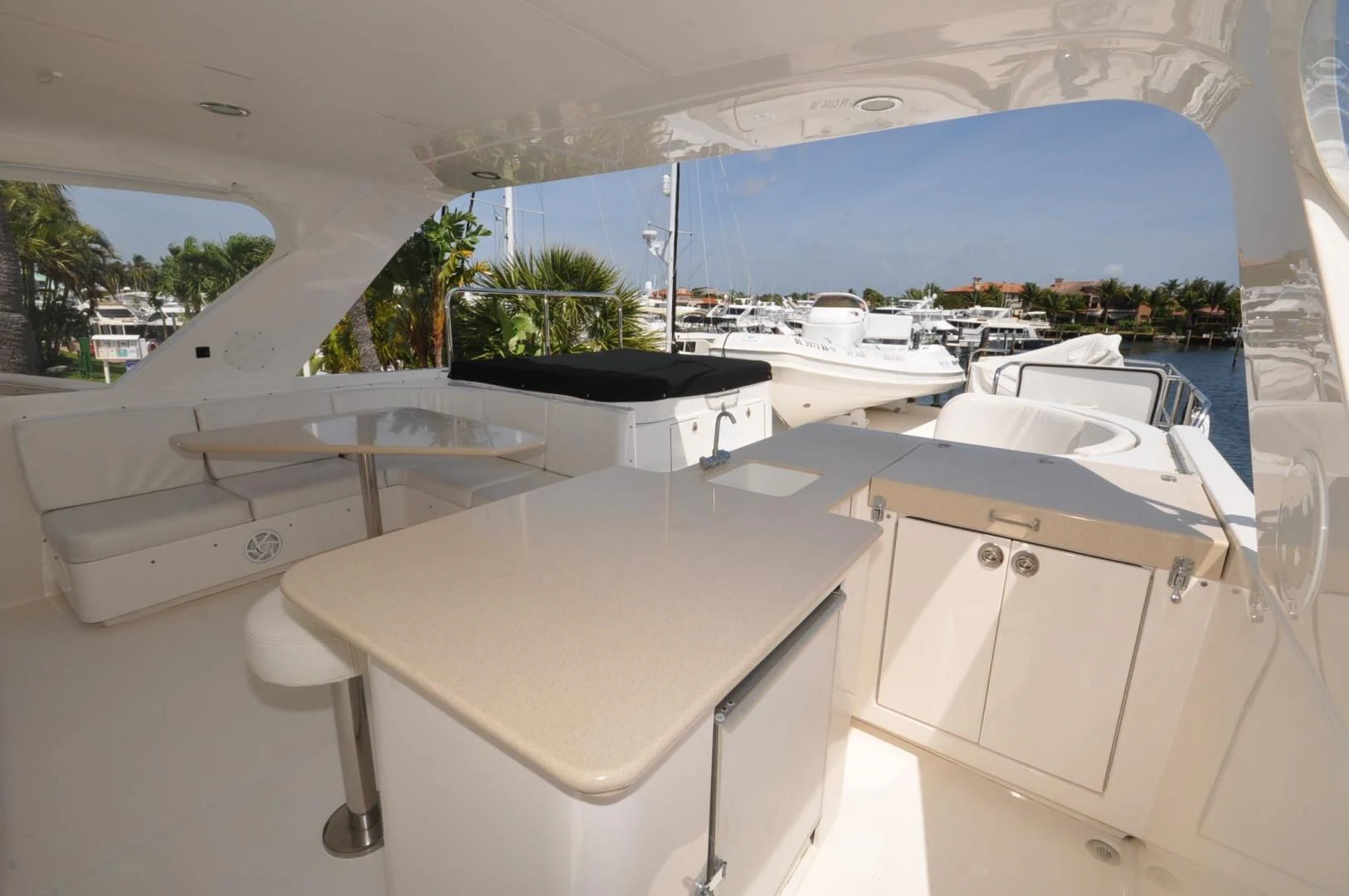 a room with white tables and white cabinets aboard LUCK A LEE IV Yacht for Sale