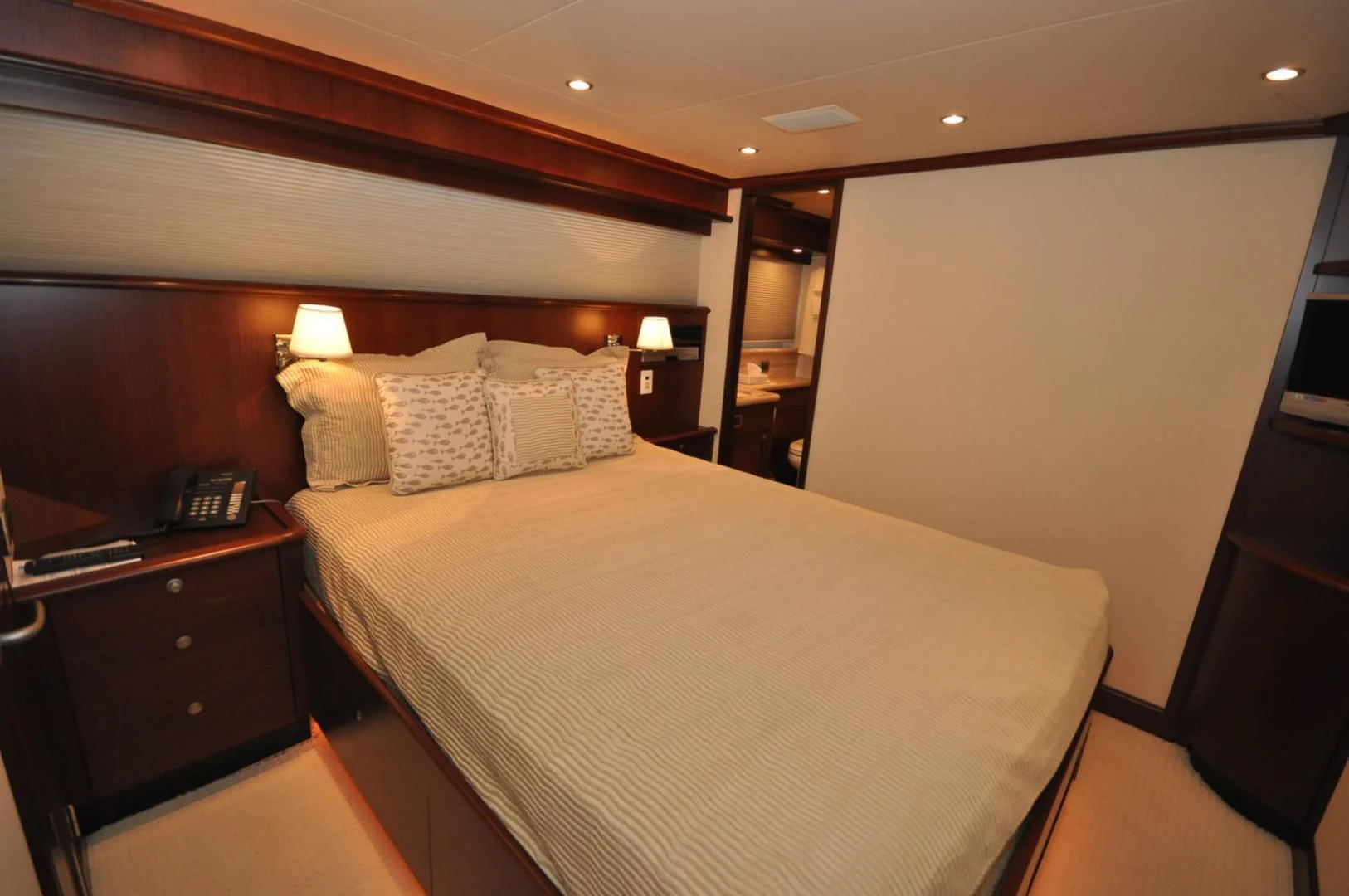 a hotel room with a bed aboard LUCK A LEE IV Yacht for Sale
