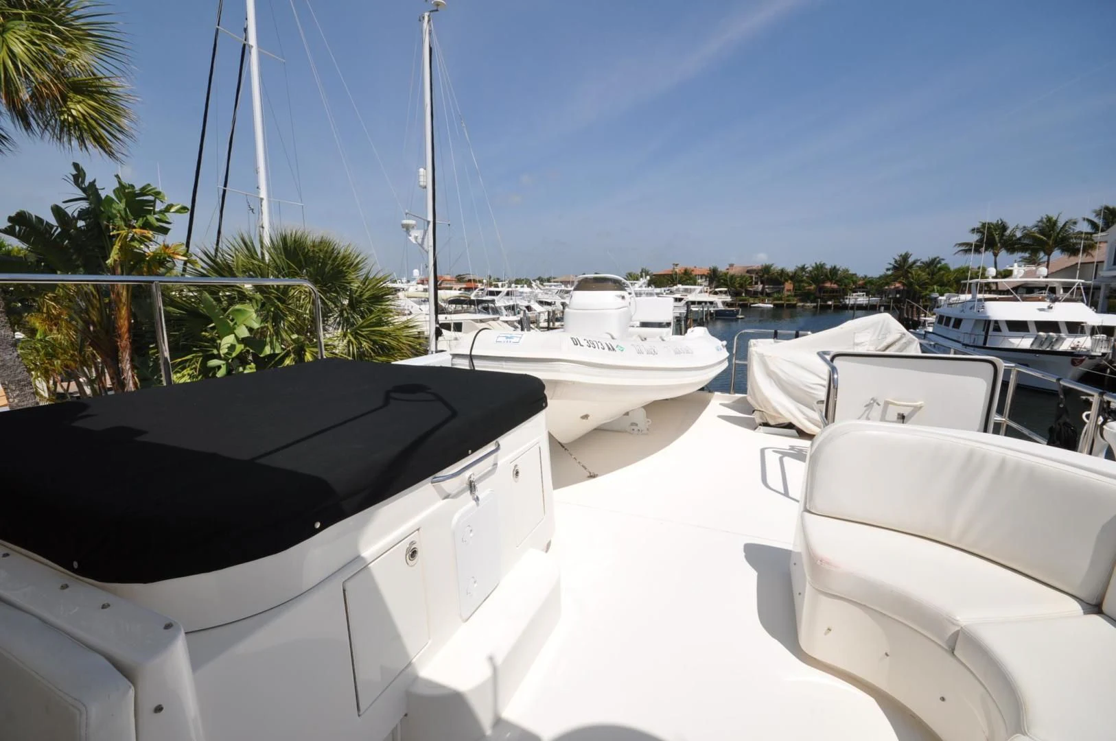 a group of boats are parked in a row on a beach aboard LUCK A LEE IV Yacht for Sale