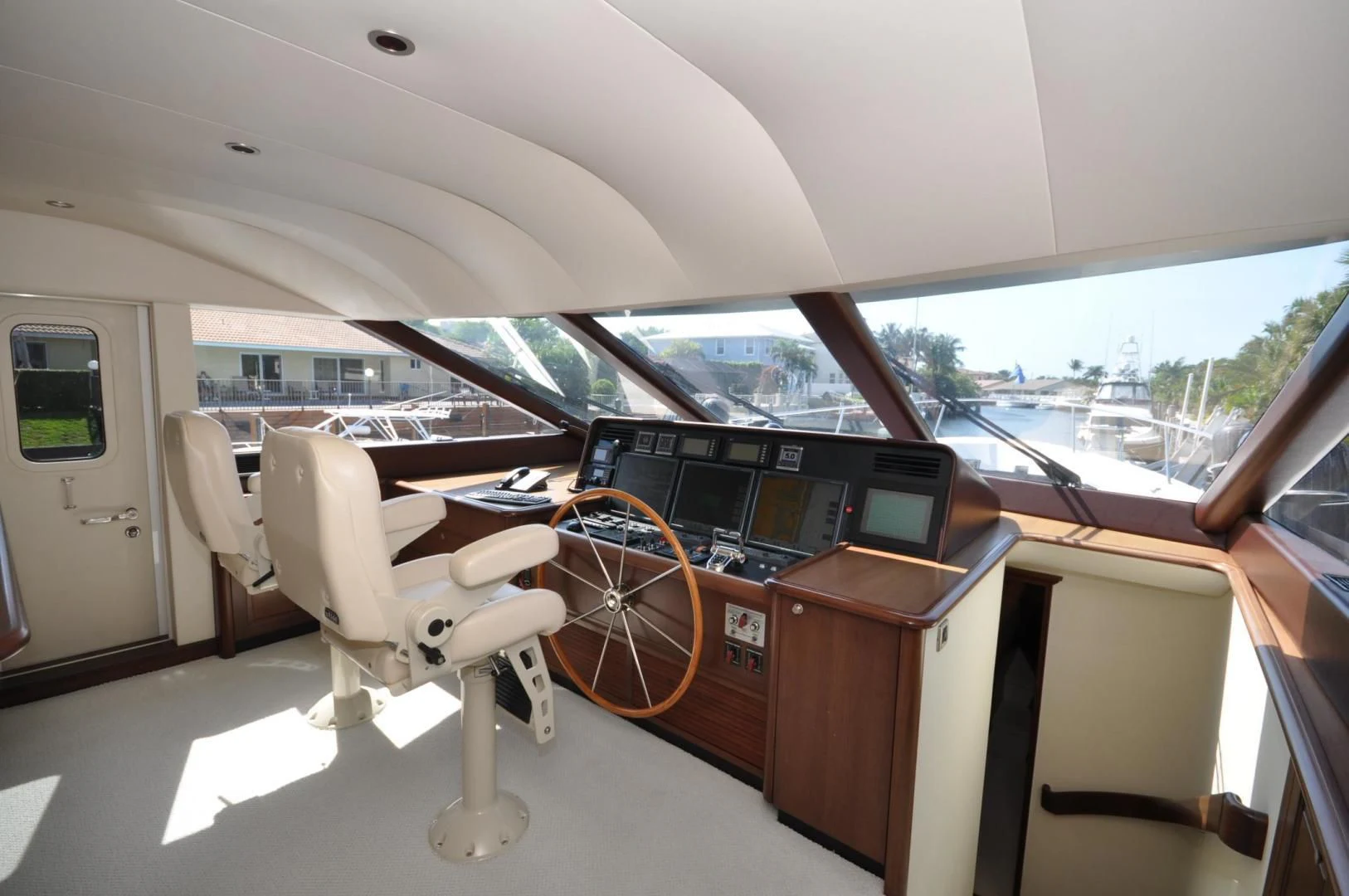 a car with a desk and a chair in it aboard LUCK A LEE IV Yacht for Sale