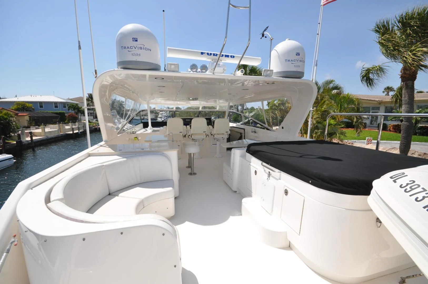 a white boat with a black top aboard LUCK A LEE IV Yacht for Sale