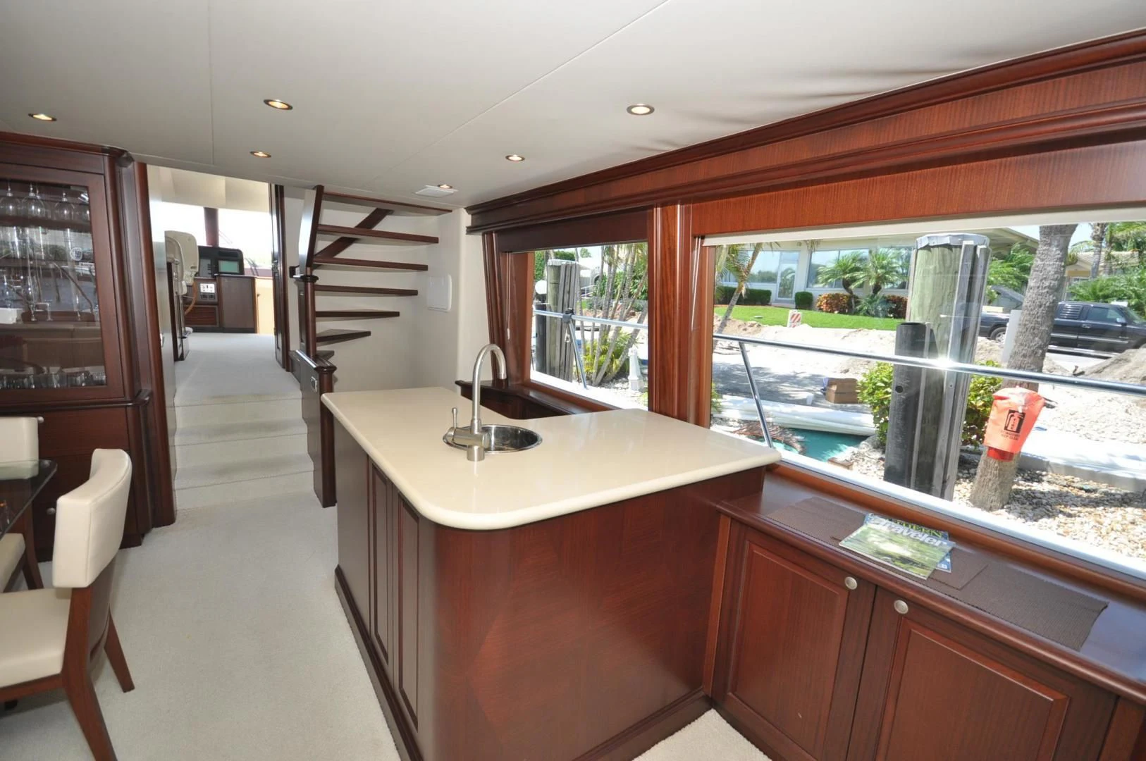 a kitchen with a sink and a window aboard LUCK A LEE IV Yacht for Sale
