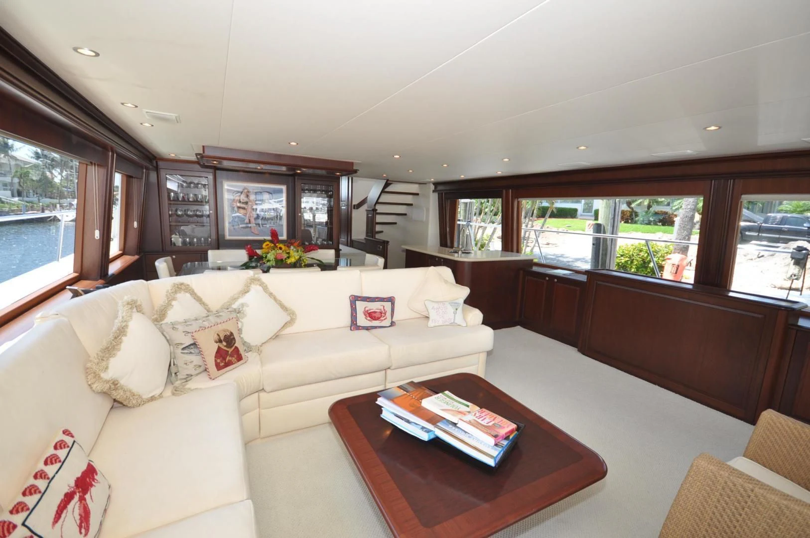 a living room with a couch and a coffee table aboard LUCK A LEE IV Yacht for Sale