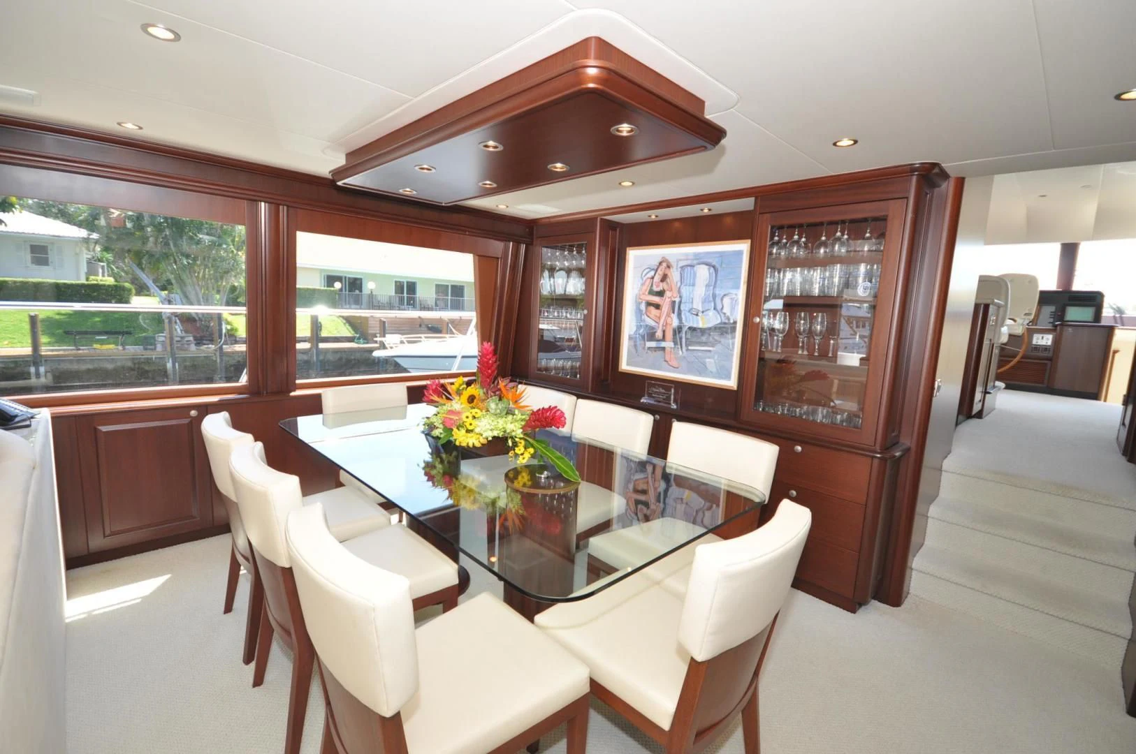 a dining room with a table and chairs aboard LUCK A LEE IV Yacht for Sale