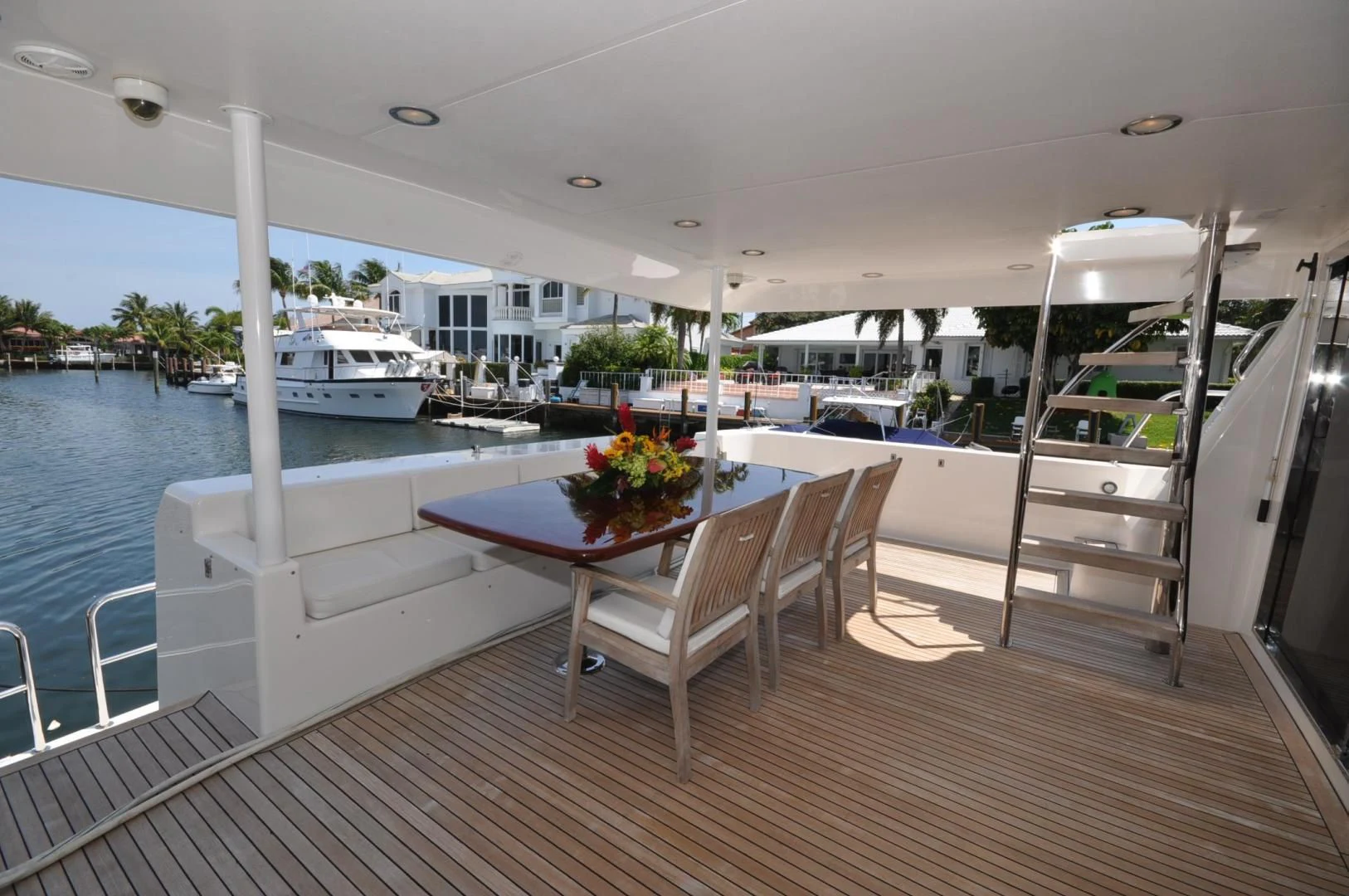a table and chairs on a boat aboard LUCK A LEE IV Yacht for Sale