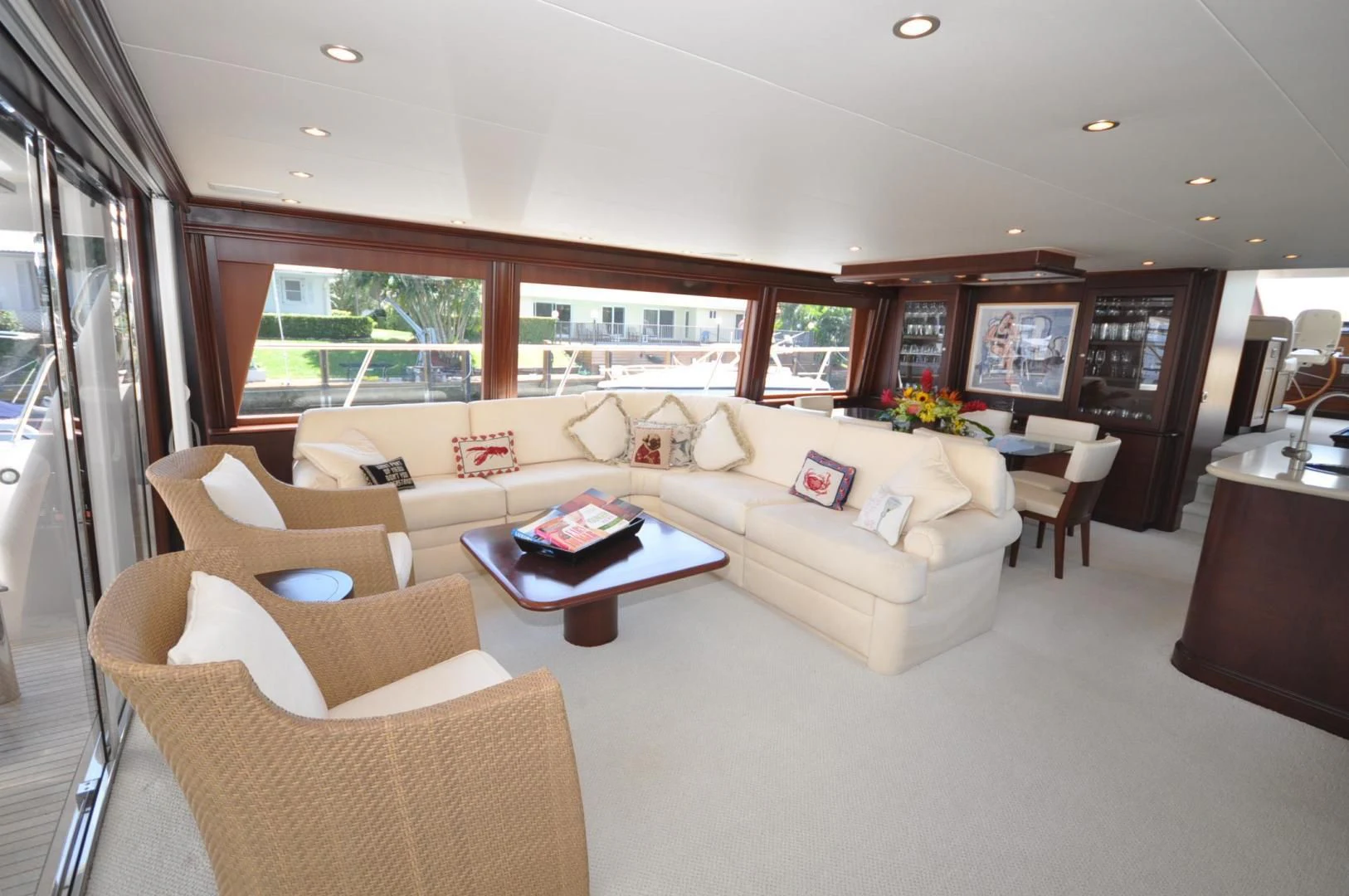 a living room with a couch and a coffee table aboard LUCK A LEE IV Yacht for Sale