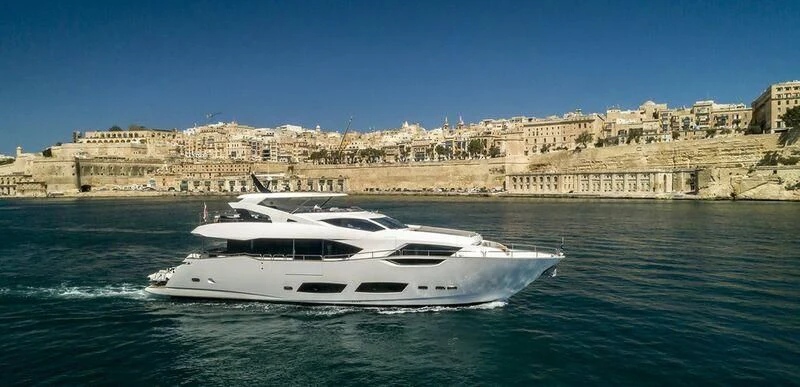 a white yacht in the water aboard TAKE OFF Yacht for Sale