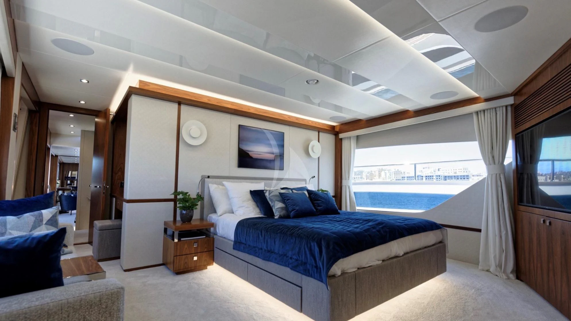 a large bedroom with a large bed aboard TAKE OFF Yacht for Sale