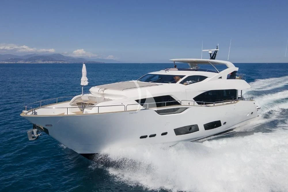 a white yacht on the water aboard TAKE OFF Yacht for Sale