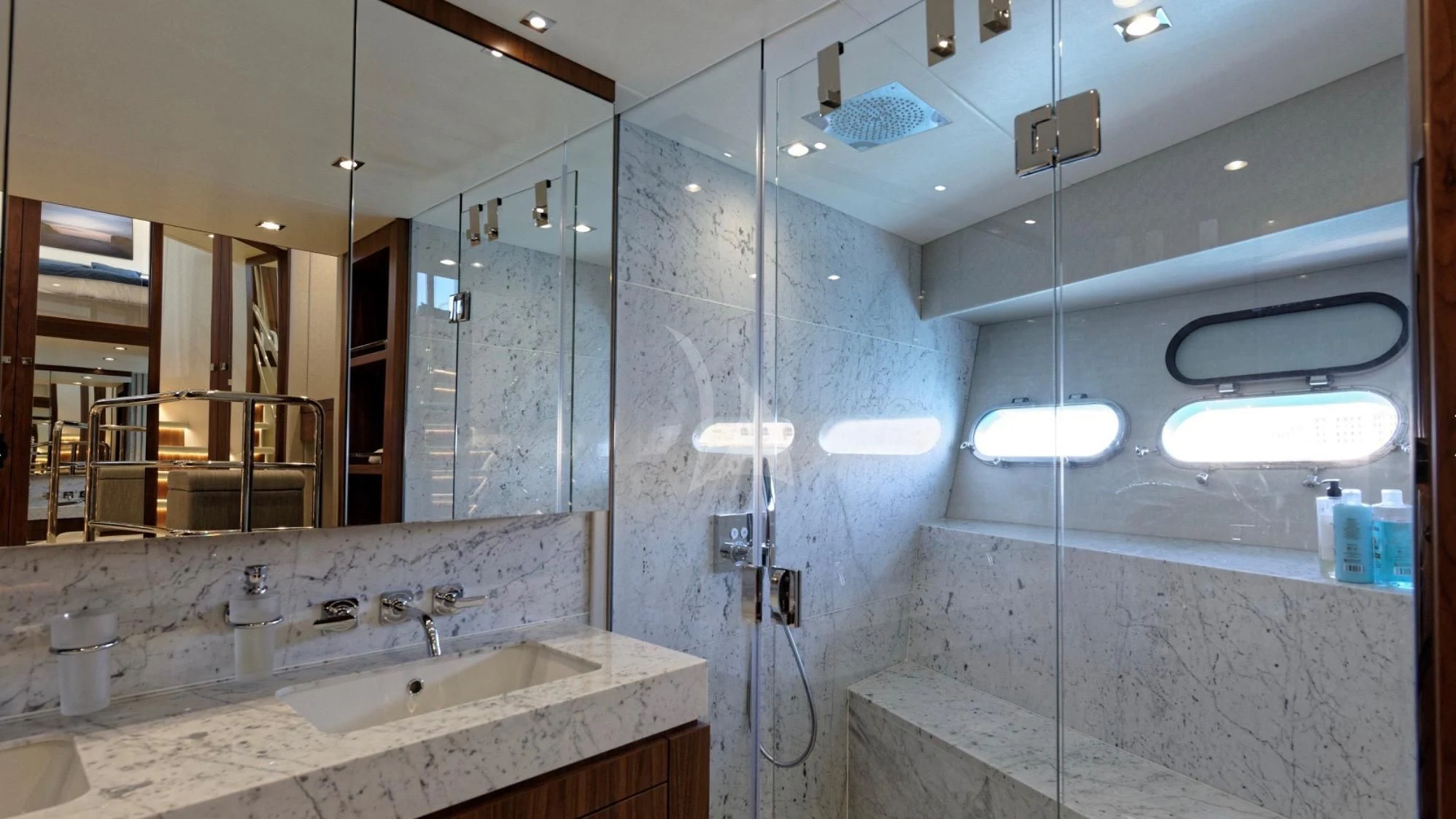 a bathroom with a large mirror aboard TAKE OFF Yacht for Sale