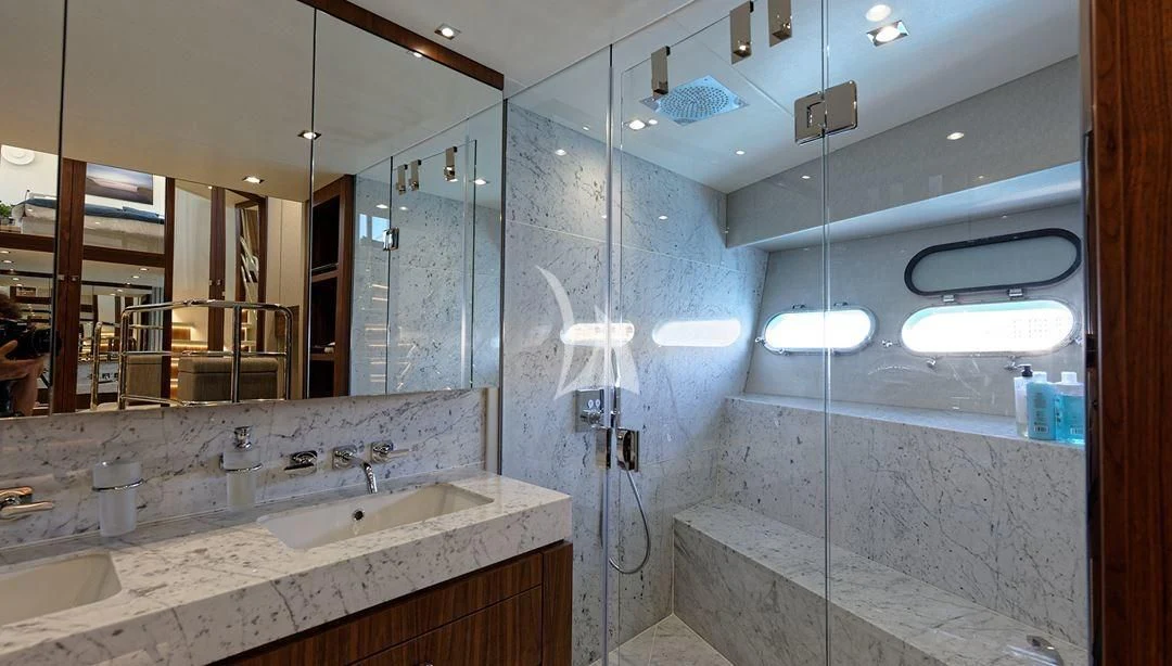 a bathroom with a large mirror aboard TAKE OFF Yacht for Sale