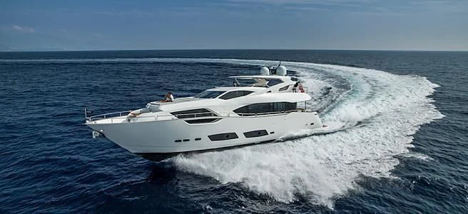 a white yacht on the water aboard TAKE OFF Yacht for Sale