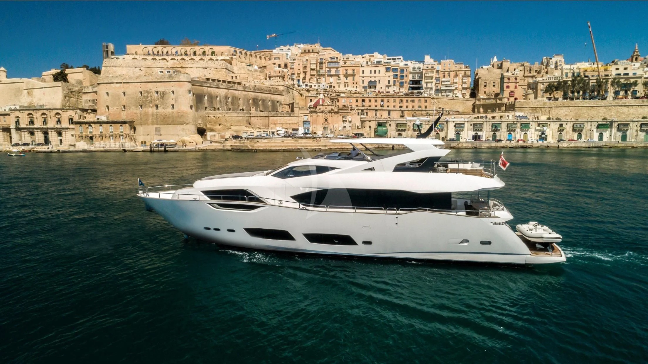 a white yacht on the water aboard TAKE OFF Yacht for Sale