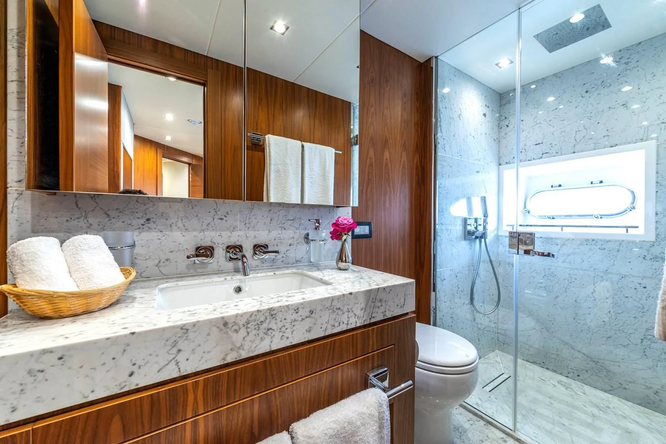 a bathroom with a sink and a toilet aboard TAKE OFF Yacht for Sale