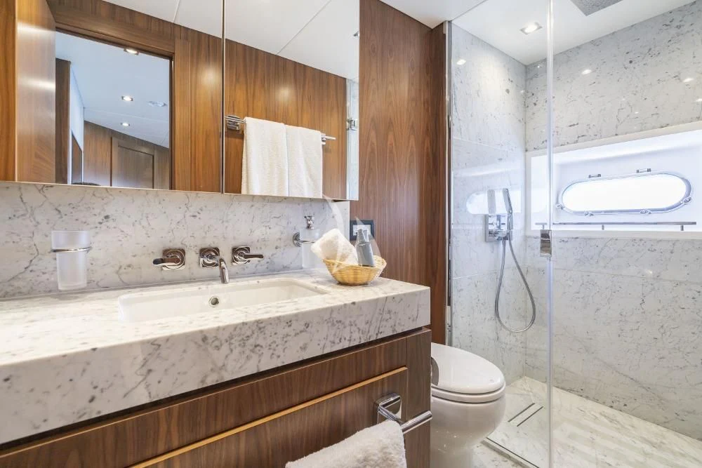 a bathroom with a sink and a toilet aboard TAKE OFF Yacht for Sale